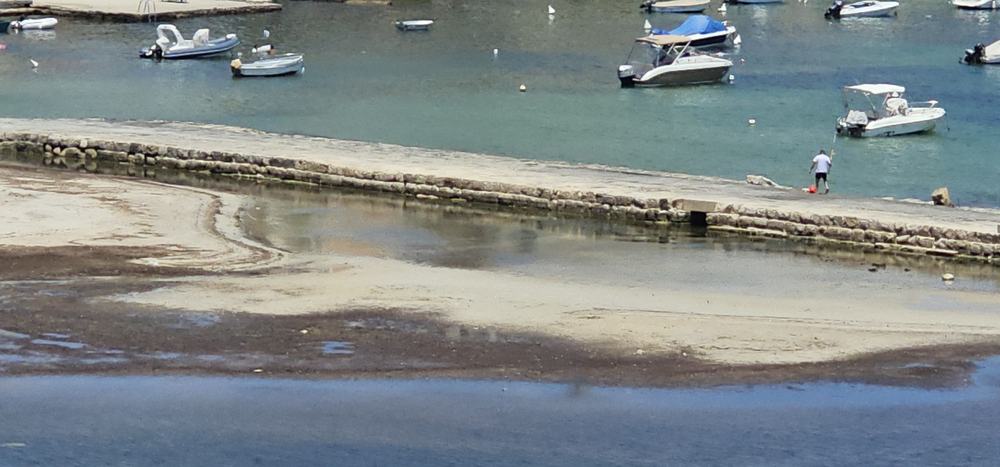 Lone fisherman scares of the seabirds at Salina Nature Reserve